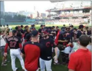  ?? TIM PHILLIS - FOR THE NEWS-HERALD ?? Indians players celebrate after clinching the American League Central Division title on Sept. 15.