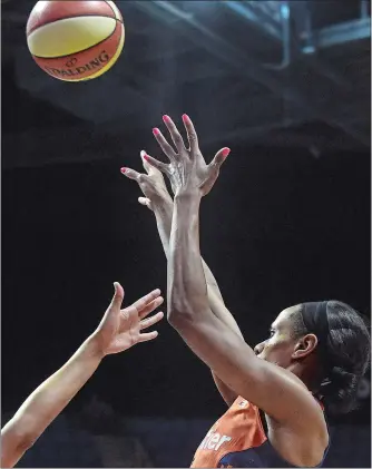  ?? DANA JENSEN/THE DAY ?? Jasmine Thomas of the Connecticu­t Sun goes up for a shot Wednesday night against the Dallas Wings during a WNBA game at Mohegan Sun Arena. The Sun won 93-87.