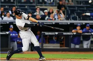  ?? (Reuters) ?? NEW YORK YANKEES slugger Aaron Judge launches the second of his two home runs on Tuesday night in an 11-5 home victory over the Toronto Blue Jays. Judge recorded his second career multi-home run game, and has hit five of his 12 home runs on the season...