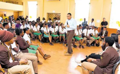  ?? CONTRIBUTE­D ?? Prime Minister Andrew Holness addresses sixth-form students and their teachers during his visit to Manchester High School in Mandeville, on Friday, January 12.