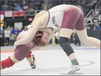  ?? Phoebe Sheehan / times union ?? Albany Academy’s drew Bogdan, left, was beaten by Shen’s Colden dorfman in a division i 160-pound match on friday at times union Center in Albany.