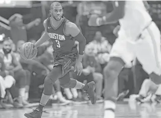  ?? Yi-Chin Lee / Houston Chronicle ?? Chris Paul, left, gave the Rockets a two-headed monster at guard this season alongside James Harden. Paul played in 58 games, averaging 18.6 points on 46 percent shooting from the floor.