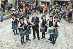 ??  ?? WINNERS: members of Lochaber schools pipe band received awards at the final show
on Fort William High Street on Friday