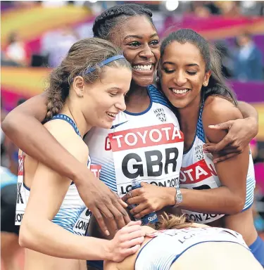  ??  ?? Great Britain’s women celebrate booking their slot in today’s 4x400m relay final.