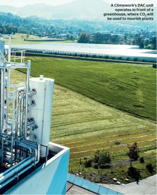  ??  ?? A Climework’s DAC unit operates in front of a greenhouse, where CO2 will be used to nourish plants