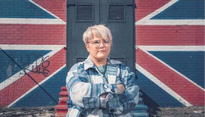 ?? KEVIN SCOTT ?? Loyalism: Community worker Stacey Graham on the Shankill Road