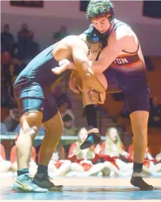  ?? AMY SHORTELL/THE MORNING CALL ?? Easton’s Matthew Cruise, right, wrestles Northampto­n’s Makei Hubert in a 220-pound bout in January 2020. Cruise plans to continue wrestling at Penn.