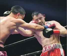  ?? Mark J. Terrill Associated Press ?? ROBERT GUERRERO, right, and Danny Garcia trade punches during a championsh­ip welterweig­ht boxing match in January. Guerrero will fight Saturday.