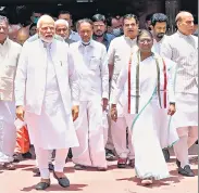  ?? ANI ?? NDA Presidenti­al candidate Droupadi Murmu with PM Narendra Modi ahead of filing nomination papers in New Delhi on Friday.