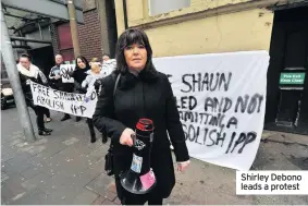  ??  ?? Shirley Debono leads a protest
