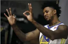  ?? AP PHOTO/MARCIO JOSE SANCHEZ ?? In this Friday file photo, Golden State Warriors’ Nick Young gestures during the NBA basketball team’s media day in Oakland.