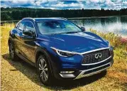  ??  ?? The QX30’s highly sculpted exterior, unique crossover stance and asymmetric cabin design exemplify Infiniti’s design-led approach to product developmen­t.