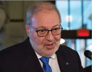  ?? JACQUES BOISSINOT/THE CANADIAN PRESS ?? After two days of caucus meetings, the Liberal party will not change its stance against barring authority figures from wearing religious symbols, interim leader Pierre Arcand says.