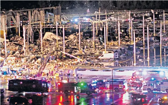  ?? ?? Emergency crews respond to a collapsed Amazon warehouse in Illinois; a man tries to shut off a leaking gas meter after his shop was destroyed in Kentucky, right