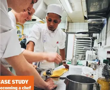  ??  ?? CASE STUDY Becoming a chef
Danay Berhane (right) at work in a busy kitchen environmen­t