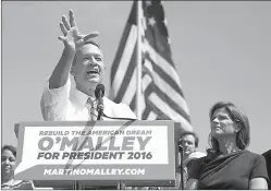  ?? Associated Press ?? Former Maryland Gov. Martin O’Malley speaks during an event Saturday to announce that he is entering the Democratic presidenti­al race in Baltimore, as his wife Katie, right, looks on. O’Malley joined the Democratic presidenti­al race with a longshot...