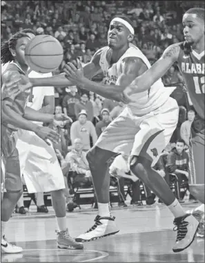  ?? NWA Media/ Andy Shupe ?? POSITIVELY PORTIS: Arkansas freshman Bobby Portis, center, collects a rebound in front of Alabama senior Trevor Releford ( 12) during the second half Wednesday at Bud Walton Arena in Fayettevil­le. Portis seeks an encore of his Alabama performanc­e, an...