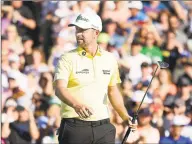  ?? Steven Ryan / Getty Images ?? Webb Simpson reacts after putting for birdie on the 18th green during the final round of the Waste Management Phoenix Open on Sunday in Scottsdale, Ariz.