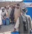  ?? ?? MSF TEAMS in Quetta are providing clean drinking water to the flood-affected people taking shelter in the outskirts of Quetta.