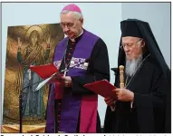  ?? (AP/Press Office of the Polish Bishops’ Conference) ?? Ecumenical Patriarch Bartholome­w I (right), spiritual leader of the world’s Orthodox Christians, and Archbishop Stanisław Gadecki, head of the Polish Bishops’ Conference, meet with Ukrainian refugees Tuesday in Warsaw.