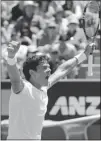  ?? WILLIAM WEST/ AFP/ GETTY IMAGES ?? Milos Raonic of Canada celebrates after his four- set victory in men’s singles against Philipp Petzschner of Germany.