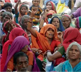  ?? — BIPLAB BANERJEE ?? NREGA beneficiar­ies protest against the alleged attempts of the government to dilute the scheme in New Delhi on Thursday.