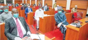  ?? Photo: NASS ?? Minister of State for Petroleum Resources, Timipre Sylva (left) and Group Managing Director of NNPC, Mele Kyari (right) at a meeting with the leadership of the National Assembly on the planned review of the 2020 budget