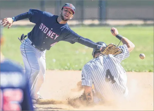  ?? RYAN TAPLIN/THE CHRONICLE HERALD ?? The throw from the catcher sails past Sydney Sooners shortstop Chris Farrow as Dartmouth Moosehead Dry centre-fielder Chris Head steals second base during Game 2 of the Nova Scotia Senior Baseball League final at Dartmouth’s Beazley Field on Sept. 23. The Sooners will host the 2020 senior baseball nationals.