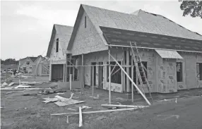  ?? THE COMMERCIAL APPEAL ?? Homes are under constructi­on in the Cherry Tree Park developmen­t off Cherry Blossom Parkway in Southaven.