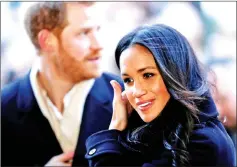  ??  ?? Prince Harry and his fiancee Markle arrive at an event in Nottingham, Britain, recently. — Reuters file photo