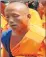  ??  ?? RELIGIOUS: Buddhist monk chants inside Dammakaya temple