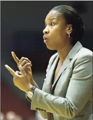  ?? Al Behrman / Associated Press ?? Former Cincinnati women’s basketball coach Jamelle Elliott is back at UConn, where she won a national championsh­ip as a player, as an assistant coach on Geno Auriemma’s staff.