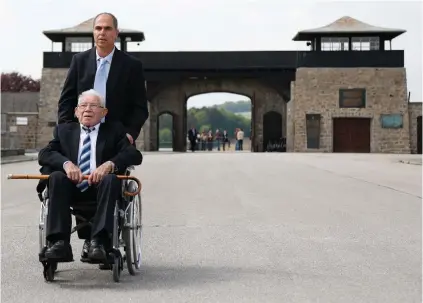  ?? (Leonhard Foeger/ Reuters) ?? CONCENTRAT­ION CAMP survivor Moshe Spitzer in front of Mauthausen, in Austria. SS doctor Josef Mengele selected him at Auschwitz as a worker to be sent there.