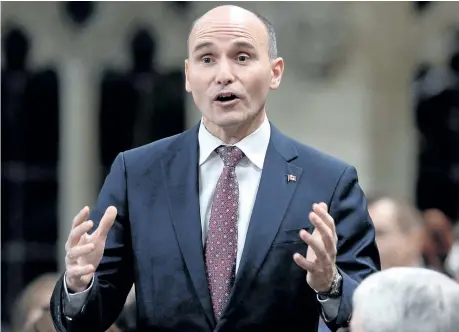  ?? JUSTIN TANG/THE CANADIAN PRESS ?? Social Developmen­t Minister Jean-Yves Duclos rises during Question Period in the House of Commons on Parliament Hill in Ottawa last week. Canadians want the federal government to find a way to make it easier to cover the basic costs of living as part...