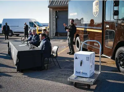  ?? Matthew Busch / Contributo­r ?? A box containing 5,000 doses of the Pfizer-BioNTech COVID-19 vaccine to be delivered to Dell Seton Medical Center in Austin is displayed at a UPS distributi­on facility. The White House Coronaviru­s Task Force says “mitigation efforts must increase.”