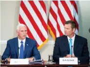  ?? ASSOCIATED PRESS FILE PHOTO ?? Vice President Mike Pence, left, and Vice Chairman Kansas Secretary of State Kris Kobach, right, speak last month during the first meeting of the Presidenti­al Advisory Commission on Election Integrity in Washington.