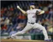  ?? MATT SLOCUM — ASSOCIATED PRESS ?? Mets’ Zack Wheeler pitches during the team’s 9-4 win over the Phillies on Monday night in Philadelph­ia.