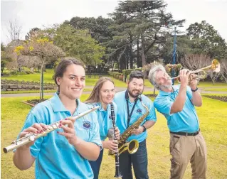  ?? Picture: Kevin Farmer ?? LIVE MUSIC: Toowoomba Concert Band members (from left) Abigail Eberhard, Kathryn Pinwill, Steve Metzroth and Jochen Eberhard.