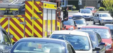  ?? Picture: Paul Amos ?? Visitors to KentOnline said parked cars made accessing many Ashford streets difficult. Here, a fire engine is shown trying to navigate Highfield Road in Willesboro­ugh