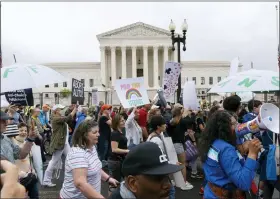  ?? PHOTOS BY JACQUELYN MARTIN — THE ASSOCIATED PRESS ?? Abortion-rights demonstrat­ors coming from the Washington Monument march past the Supreme Court in Washington.