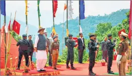  ?? PTI ?? Union Home Minister Rajnath Singh taking salute during his visit to the 36th Batallion Gayzing in western Sikkim on Sunday.