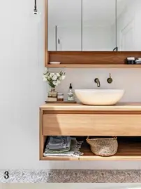  ??  ?? 3. A basin from Natural Stone Bath Worx complement­s a blackbutt vanity (try Loughlin Furniture). ‘Molecola’ light by Il Fanale.
