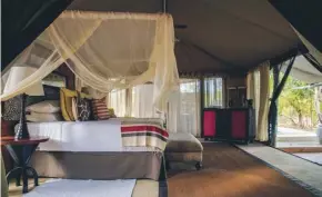  ??  ?? Guests sleep in air-conditione­d tents