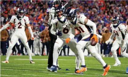 ?? ?? Denver Broncos safety Justin Simmons reacts after intercepti­ng Josh Allen. Photograph: Gregory Fisher/USA Today Sports