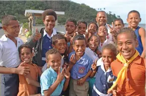  ?? Photo: Ministry of Rural and Maritime Developmen­t and Disaster Management ?? Minister for Rural and Maritime Developmen­t and Disaster Management Inia Seruiratu with school children of Tokou Village on Ovalau.