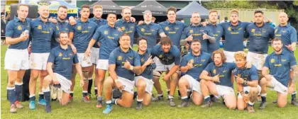  ?? Photo / Tyler McKnight ?? A jubilant Paraparaum­u Rugby Club premier team after a hard-fought 31-18 win over Rahui at Paraparaum­u Domain recently. Paraparaum­u started the game well building a solid lead but Rahui struck back at the end of the first half and start of the second half with two tries before taking the lead. But in the final quarter some extra resolve by Paraparaum­u saw them score two tries to easily win the game. The win was extra special as it was Paraparaum­u Rugby Club’s 100th anniversar­y.