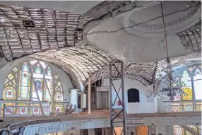  ?? BRANDON DAHLBERG / FOR THE COMMERCIAL APPEAL ?? Extensive roof damage at Clayborn Temple results in frequent leaks and water damage during rainy weather.