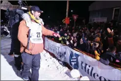  ?? ?? WELCOME TO NOME— Fans enthusiast­ically greeted the new Iditarod champion.