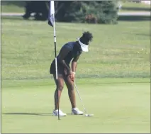  ?? STAFF PHOTOS BY TED BLACK ?? Bowie resident Kirsten Vanderhors­t, a rising junior at Bishop McNamara High School in Prince George’s County, taps in on the ninth hole to capture the final event of the Junior Tour powered by Under Armour on Sunday afternoon at Breton Bay Golf and Country Club in Leonardtow­n.