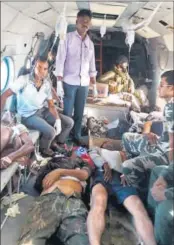  ??  ?? The CRPF jawans injured in the attack being air-lifted in a chopper. ARABINDA MAHAPATRA/HT PHOTO